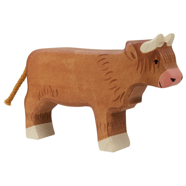 Vache Highland Cattle debout Holztiger