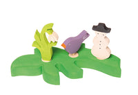 Feuille verte foncée support figurines Grimm's