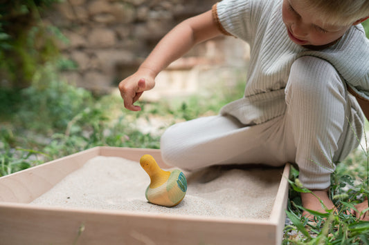 Flowing yellow bird Culbutos en bois Grapat